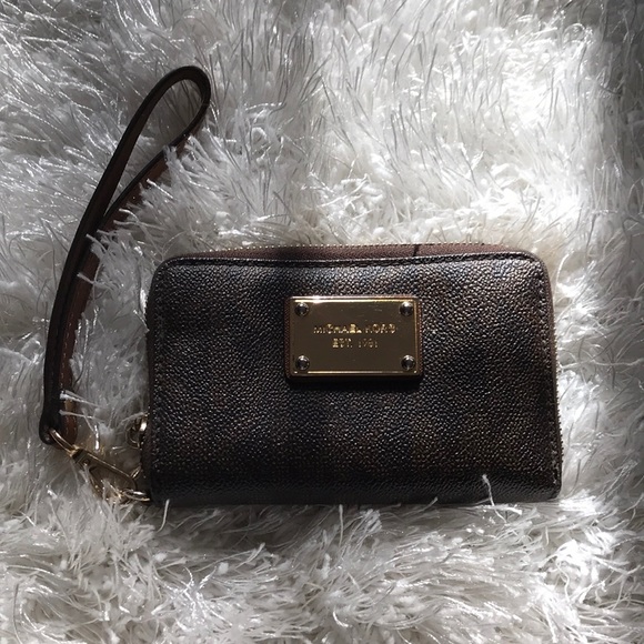 Michael Kors Handbags - Michael Kors wristlet wallet in brown MK.